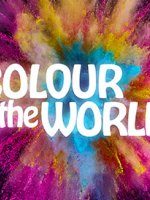 Schriftzug „Colour the world“ vor bunten Farben.